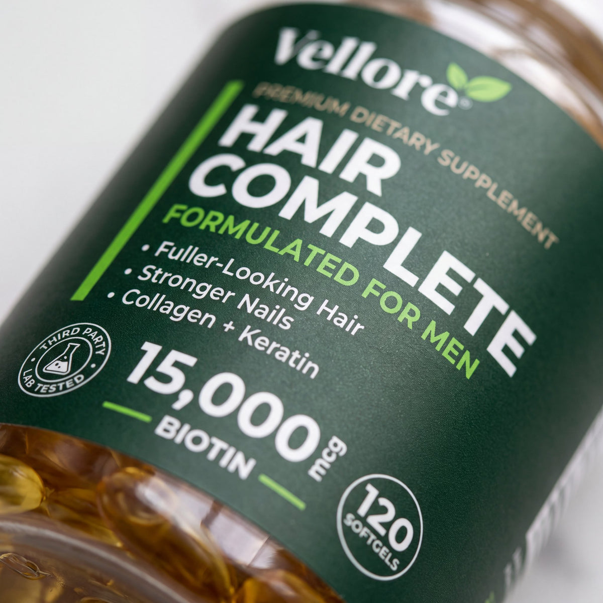 Close-up of the Hair Complete for Men label showing biotin 15,000 mcg, collagen and keratin