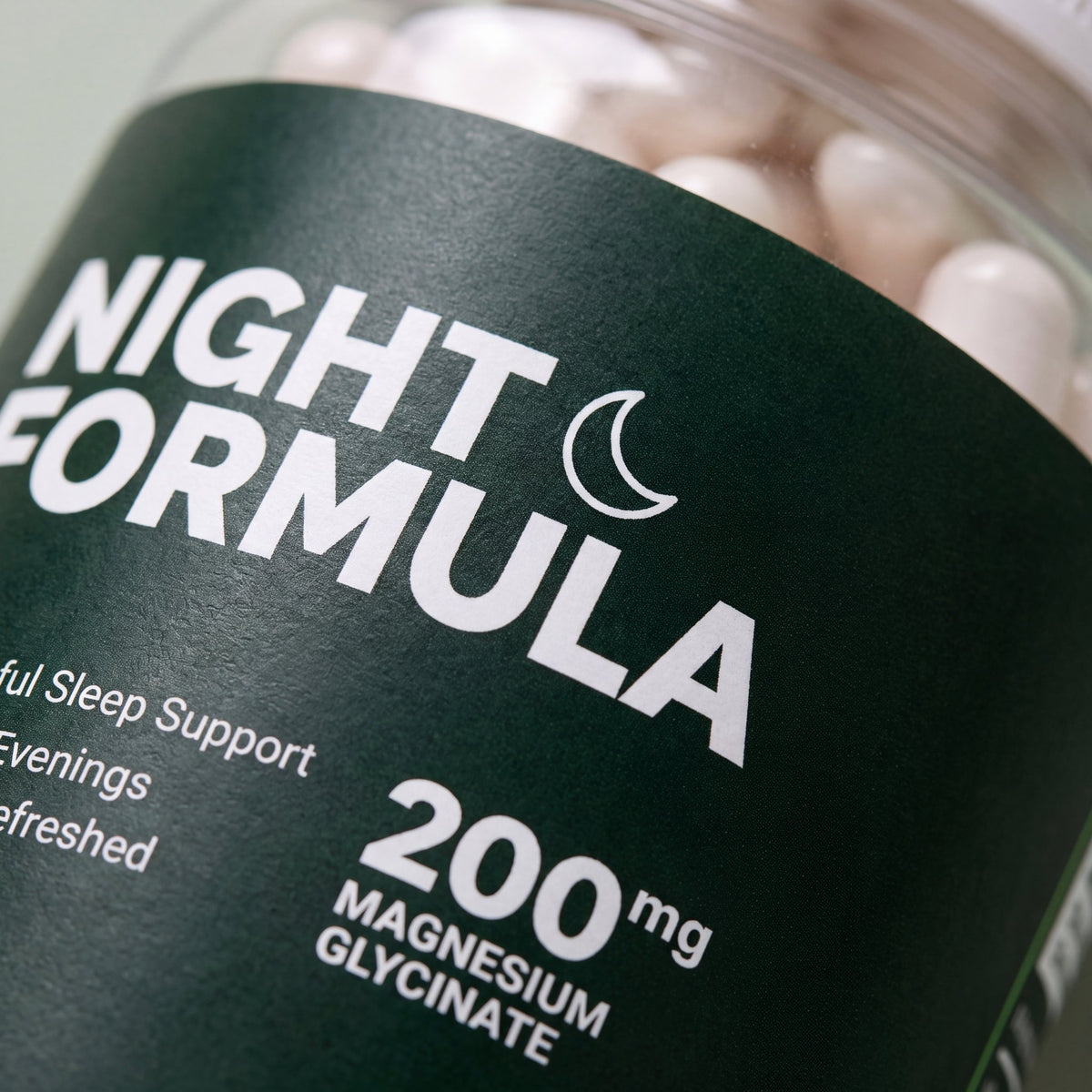 Close-up of the Night Formula label showing magnesium glycinate, L-theanine and apigenin amounts